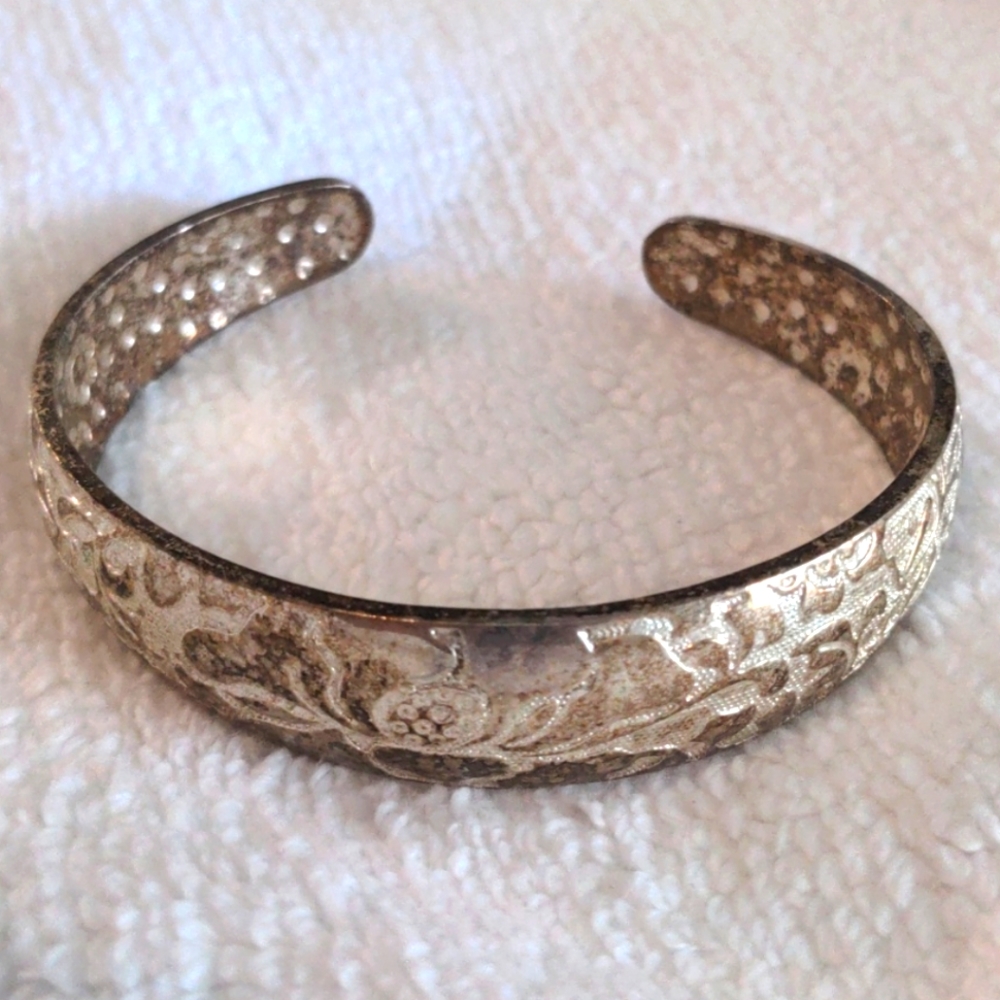 Metal floral stamped bangle
